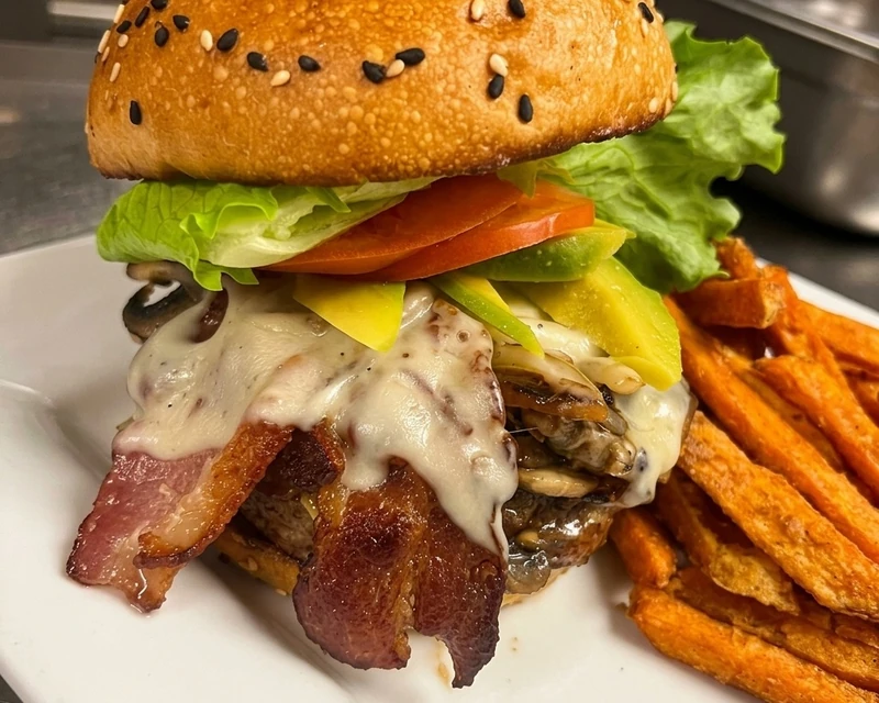 Nick's Burger with bacon and Swiss cheese - best burger in Bonnyville, AB