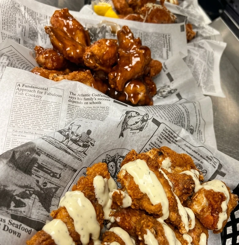Saucy chicken wings served at Nick's Lounge bar and grill in Bonnyville, AB