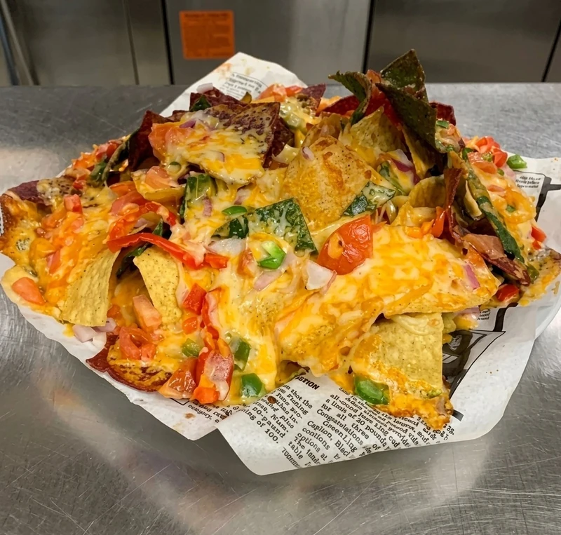 Loaded nachos to share at Nick's Lounge bar and grill in Bonnyville, AB